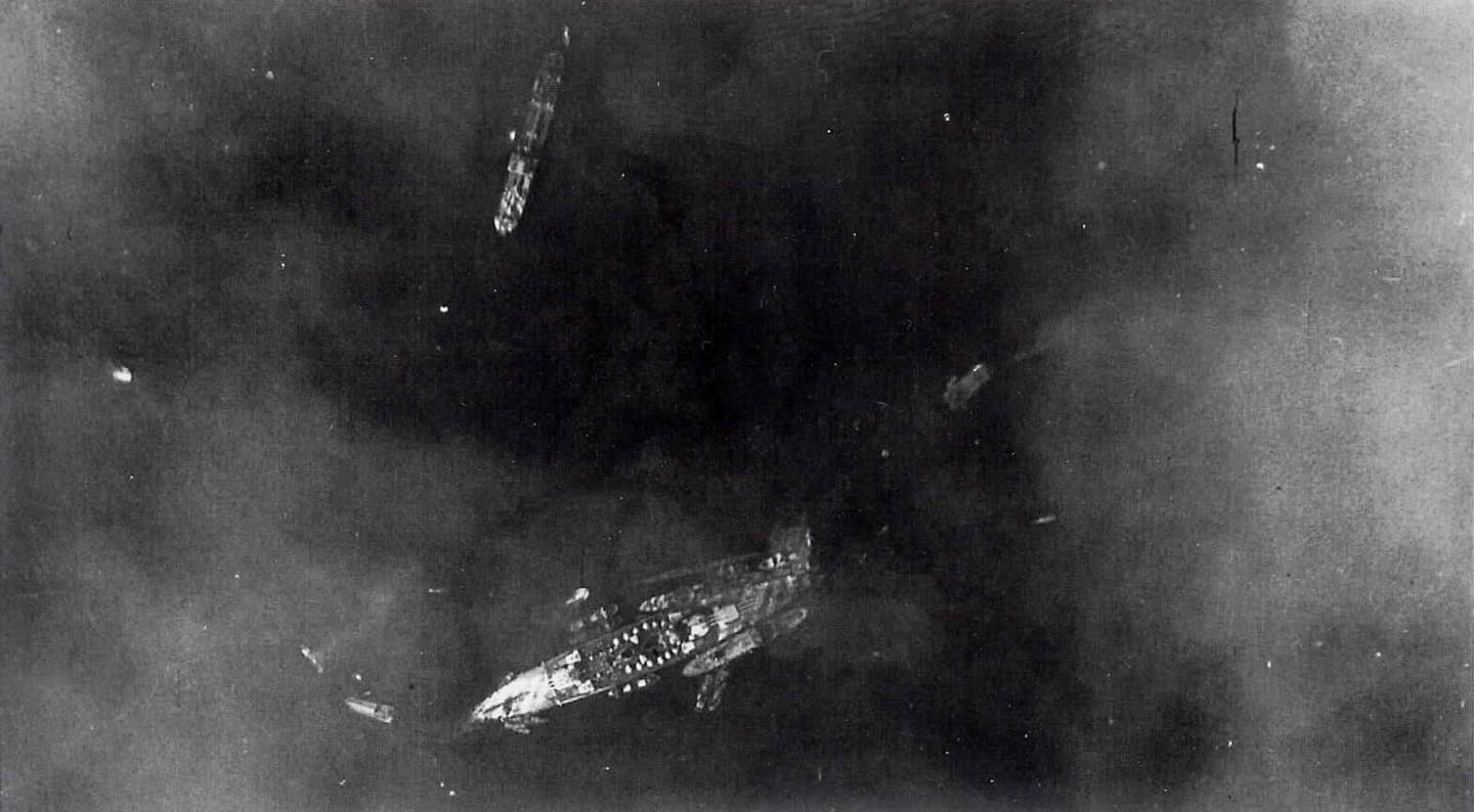 <em>Battleship </em>Littorio<em> surrounded by tugs after Operation Judgement (Public Domain)</em>