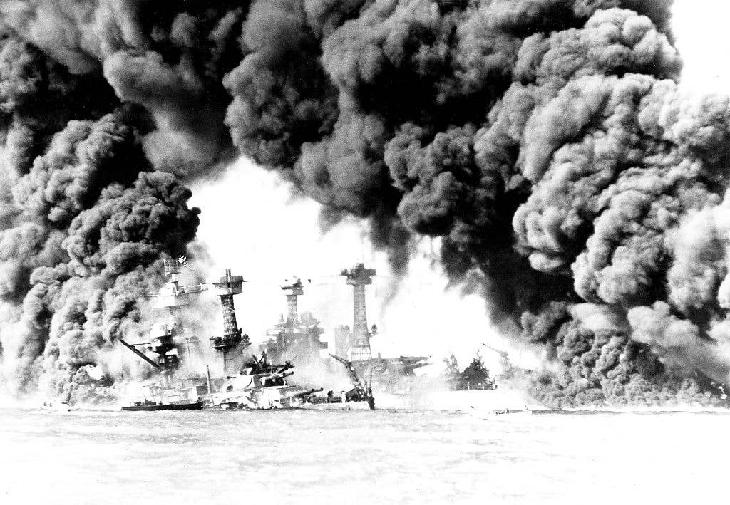 US ships 'Virginia' and 'Tennessee' on fire after the Pearl Harbor attack, December 7, 1941, World War II, Washington, National archives, . (Photo by: Photo12/Universal Images Group via Getty Images)