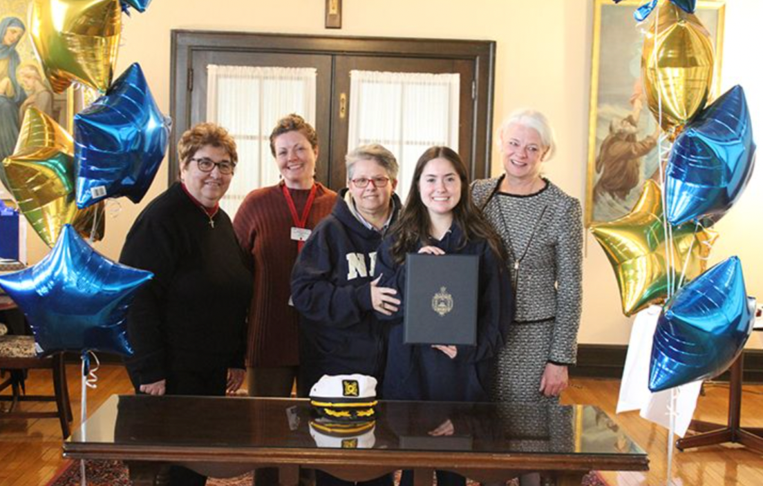 Renee upon receiving her Naval Academy appointment. Photo via Mount Saint Mary Academy