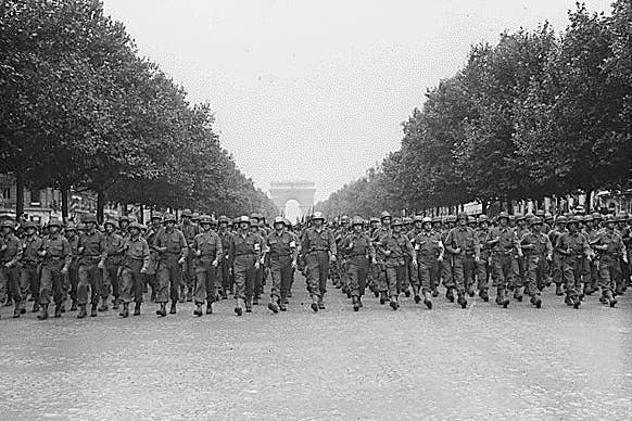 soldiers march in Paris during the Victory Parade