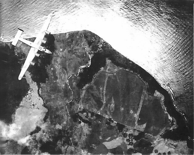Cape Gloucester airdrome during pre-invasion bombing. Public Domain.