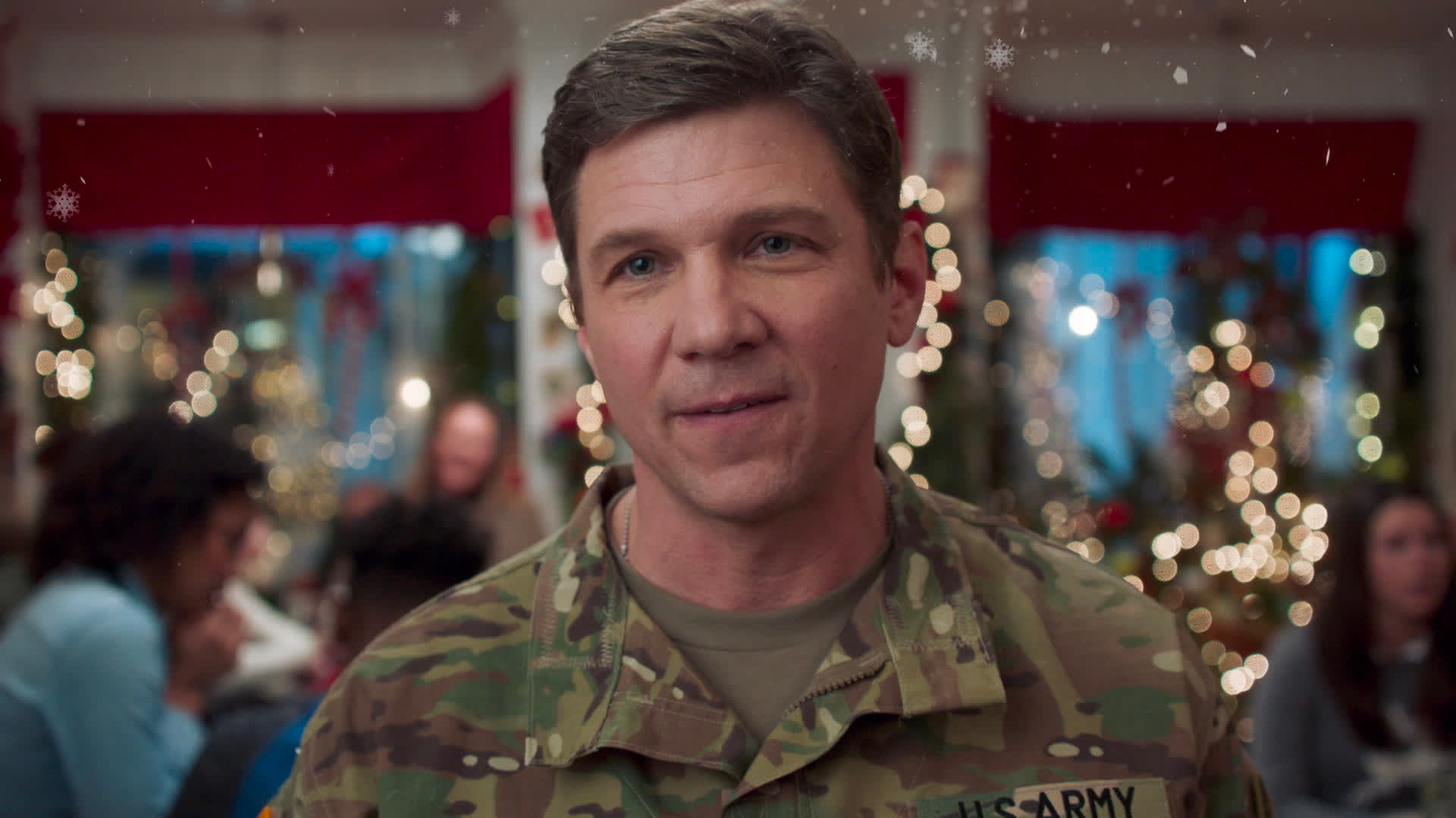 a US soldier in uniform as part of a Hallmark movie