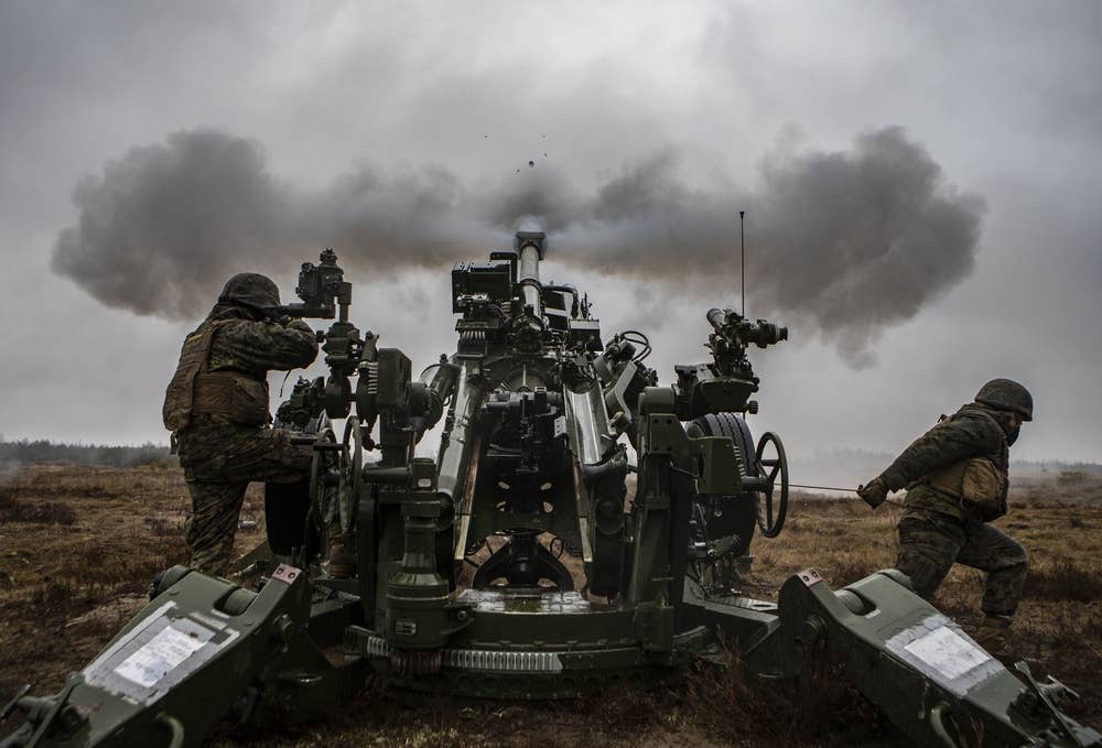 <em>Marines fire an M777 on exercise in Latvia (U.S. Marine Corps)</em>