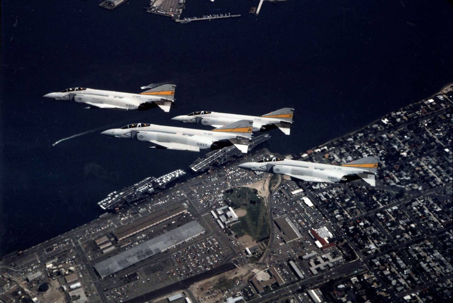 <em>A formation of F-4S Phantom IIs over NAS North Island with Viper in the lead aircraft, March 27, 1981 (U.S. Navy)</em>