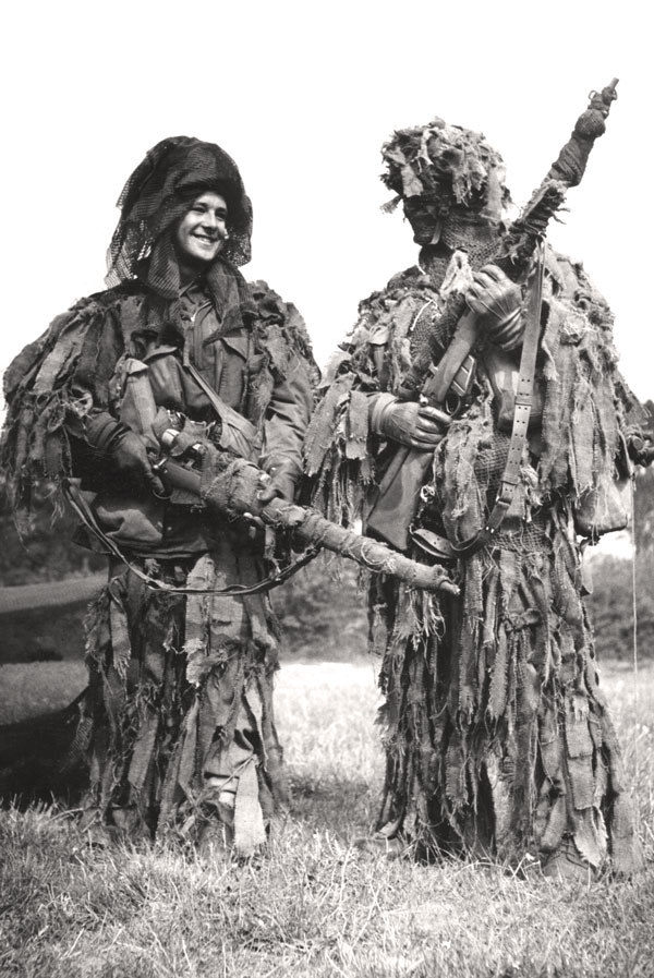 <em>Lovat scouts in their ghillie suits. Wikimedia Commons.</em>