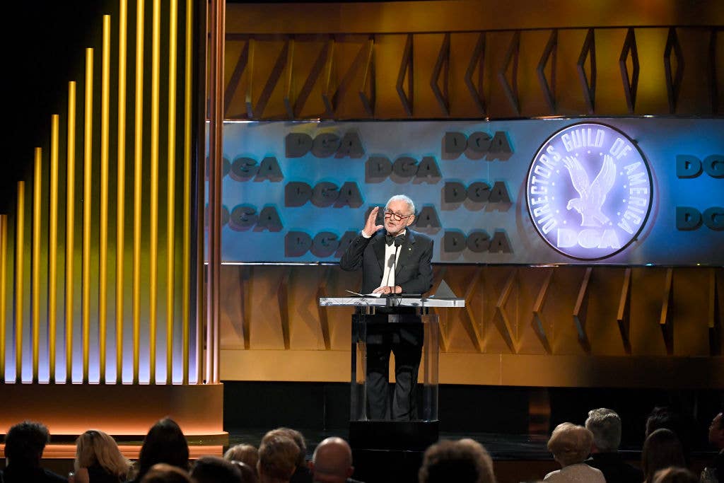 Norman Jewison speaks on stage at an event