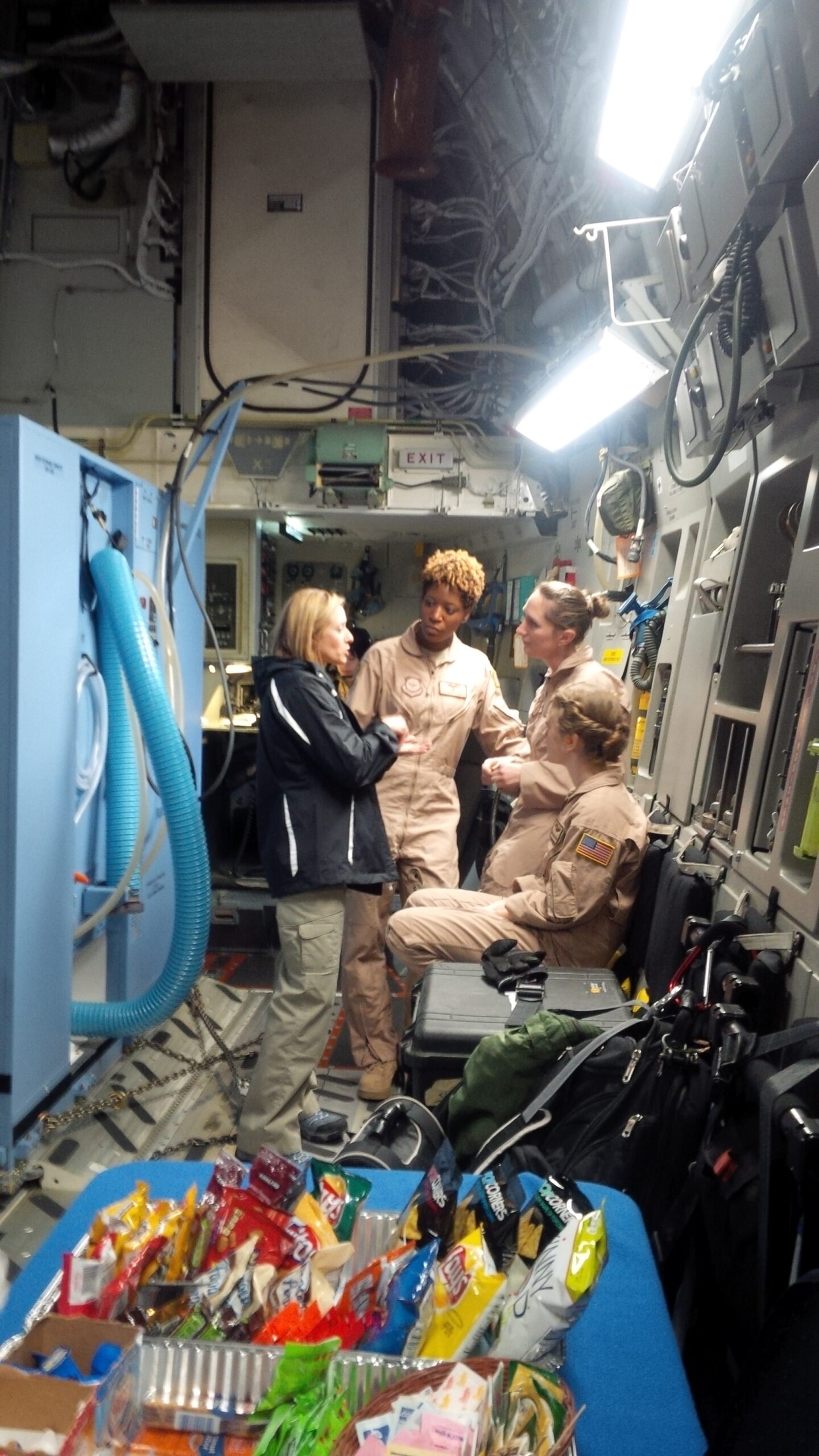Corie Weathers meets with soldiers in what appears to be a bunker.