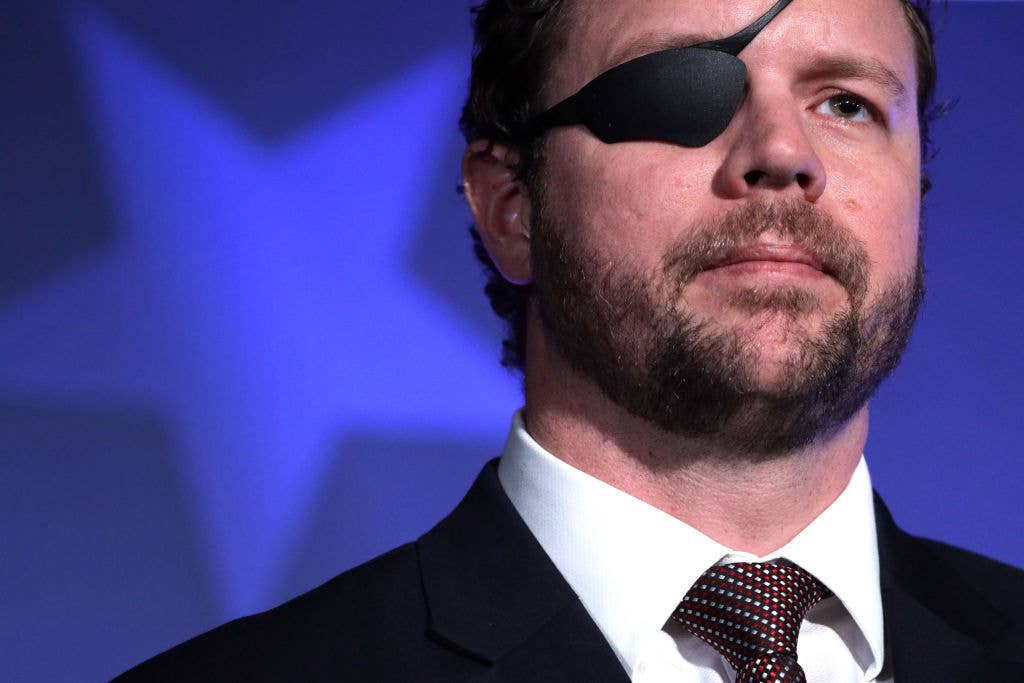 NATIONAL HARBOR, MARYLAND - FEBRUARY 26:  U.S. Rep. Dan Crenshaw (R-TX) speaks on “The Fate of Our Culture and Our Nation Hangs in the Balance” during the CPAC Direct Action Training. (Photo by Alex Wong/Getty Images)