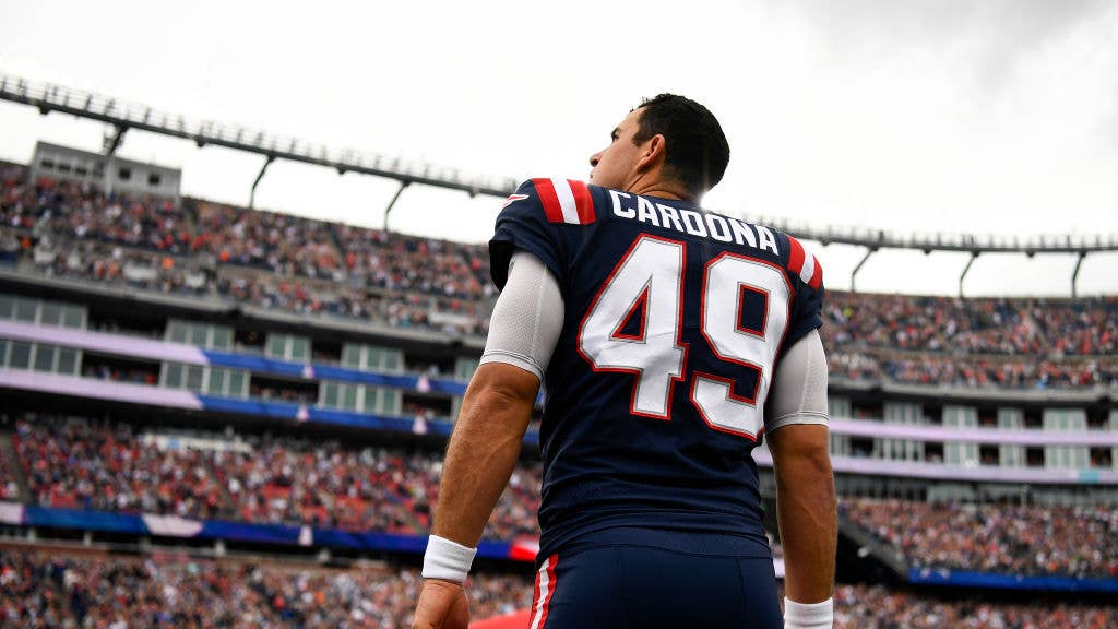 FOXBOROUGH, MASSACHUSETTS - NOVEMBER 06: Joe Cardona #49 of the New England Patriots looks on during the national anthem prior to playing the Indianapolis Colts at Gillette Stadium on November 06, 2022 in Foxborough, Massachusetts. (Photo by Billie Weiss/Getty Images)