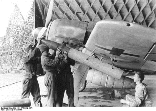 <em>Ground crew load a Fw 190's deadly Werfer-Granate 21 rocket launcher (Bundesarchiv)</em>