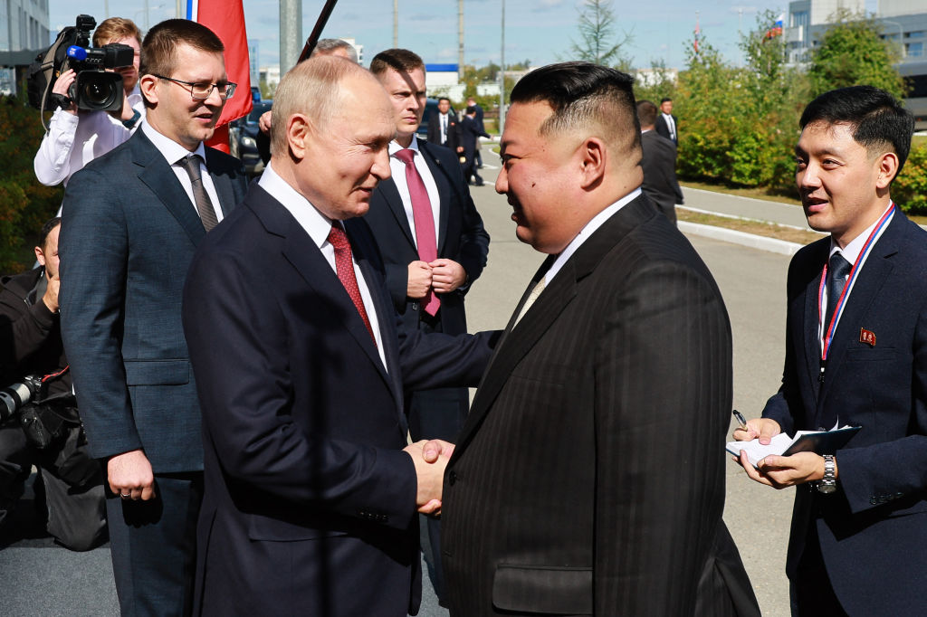You can just hear the evil.<em> In this pool photo distributed by Sputnik agency, Russia's President Vladimir Putin (Centre L) shakes hands with North Korea's leader Kim Jong Un (2nd R) during their meeting at the Vostochny Cosmodrome in Amur region on September 13, 2023. Russian President Vladimir Putin and North Korean leader Kim Jong Un both arrived at the Vostochny Cosmodrome in Russia's Far East, Russian news agencies reported on September 13, ahead of planned talks that could lead to a weapons deal. (Photo by Vladimir SMIRNOV / POOL / AFP) (Photo by VLADIMIR SMIRNOV/POOL/AFP via Getty Images)</em>