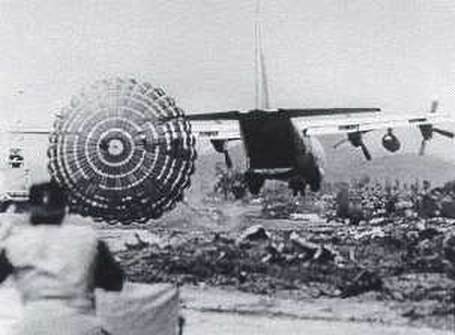 A US military plane drops supplies on the ground during the Battle of Khe Sanh in Vietnam during the Vietnam War 