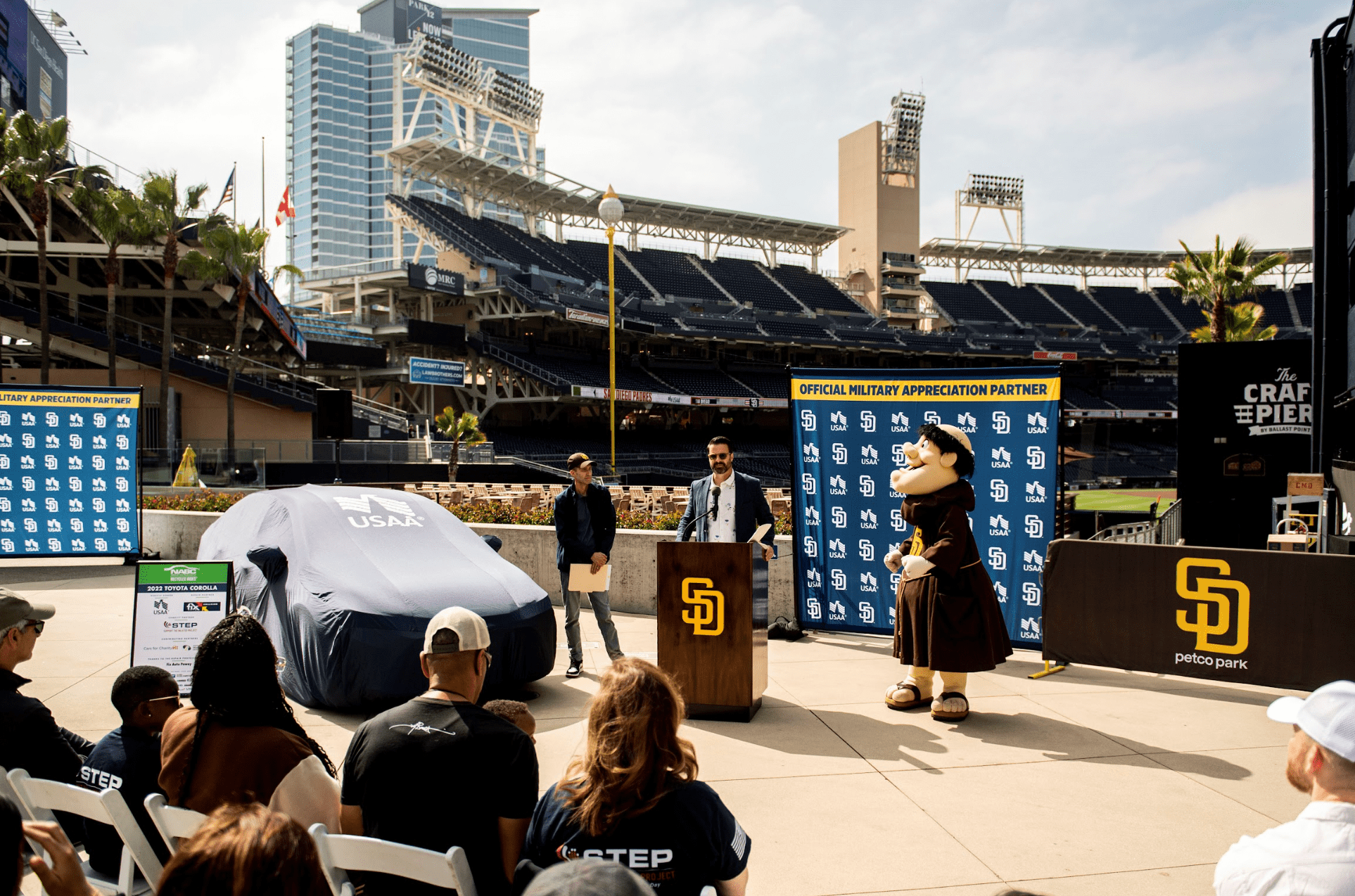 USAA presents Petty Officer Olusola Smith a new car before a Padres game April 2024. Photo: USAA