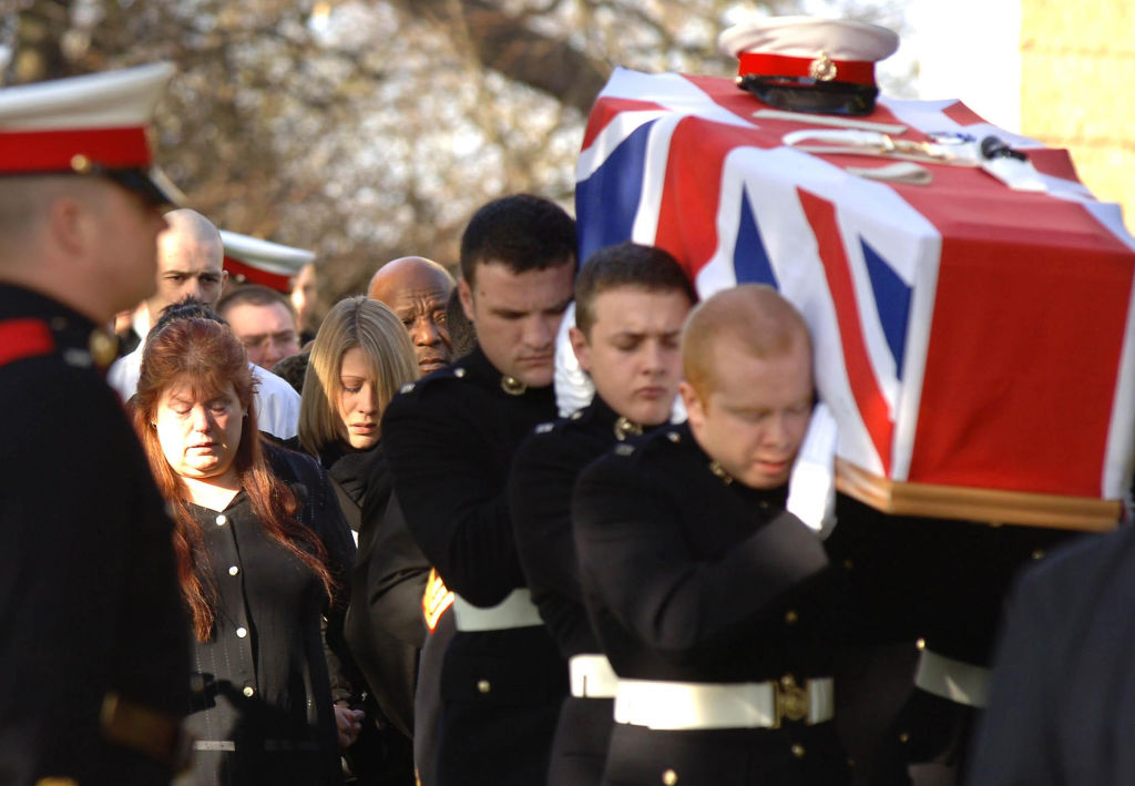 Family and friends follow the coffin of Lance Corporal Mathew Ford as it is carried by fellow soldiers from 45 Commando Royal Marines into St Andrew's church in Immingham, Lincolnshire, for his funeral.   (Photo by John Giles - PA Images/PA Images via Getty Images)