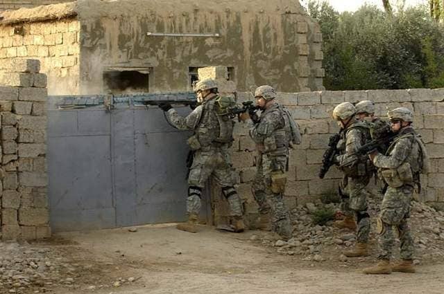 Troops from the 82nd Airborne in Iraq in 2008 engaging in combat . . . something their commander says they won't be doing when they go over this time. (Photo: Senior Airman Steve Czyz, U.S. Air Force)