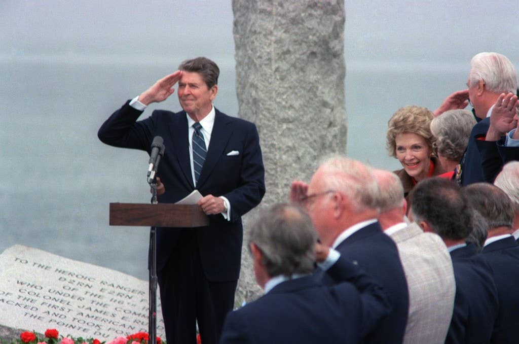 President Ronald Reagan salutes during a ceremony commemorating the 40th anniversary of D-day, the invasion of Europe.