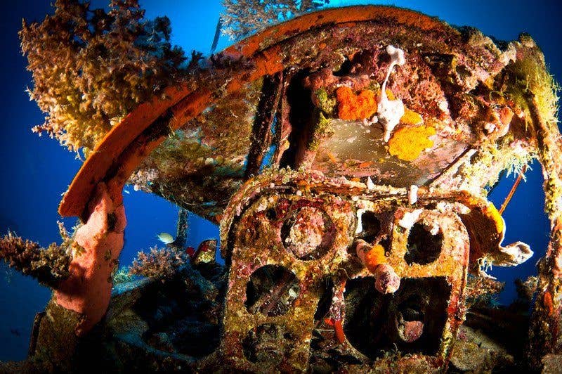 Amazing photos show an underwater graveyard filled with WWII airplanes