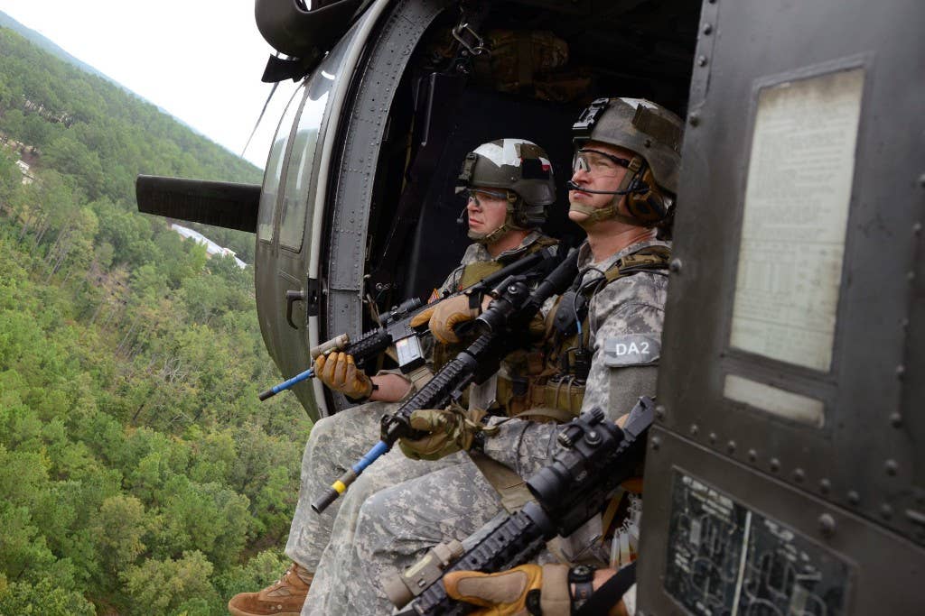 Special Forces candidates ride to a compound during training at Fort Bragg, North Carolina. Photo: US Army Sgt. Justin P. Morelli