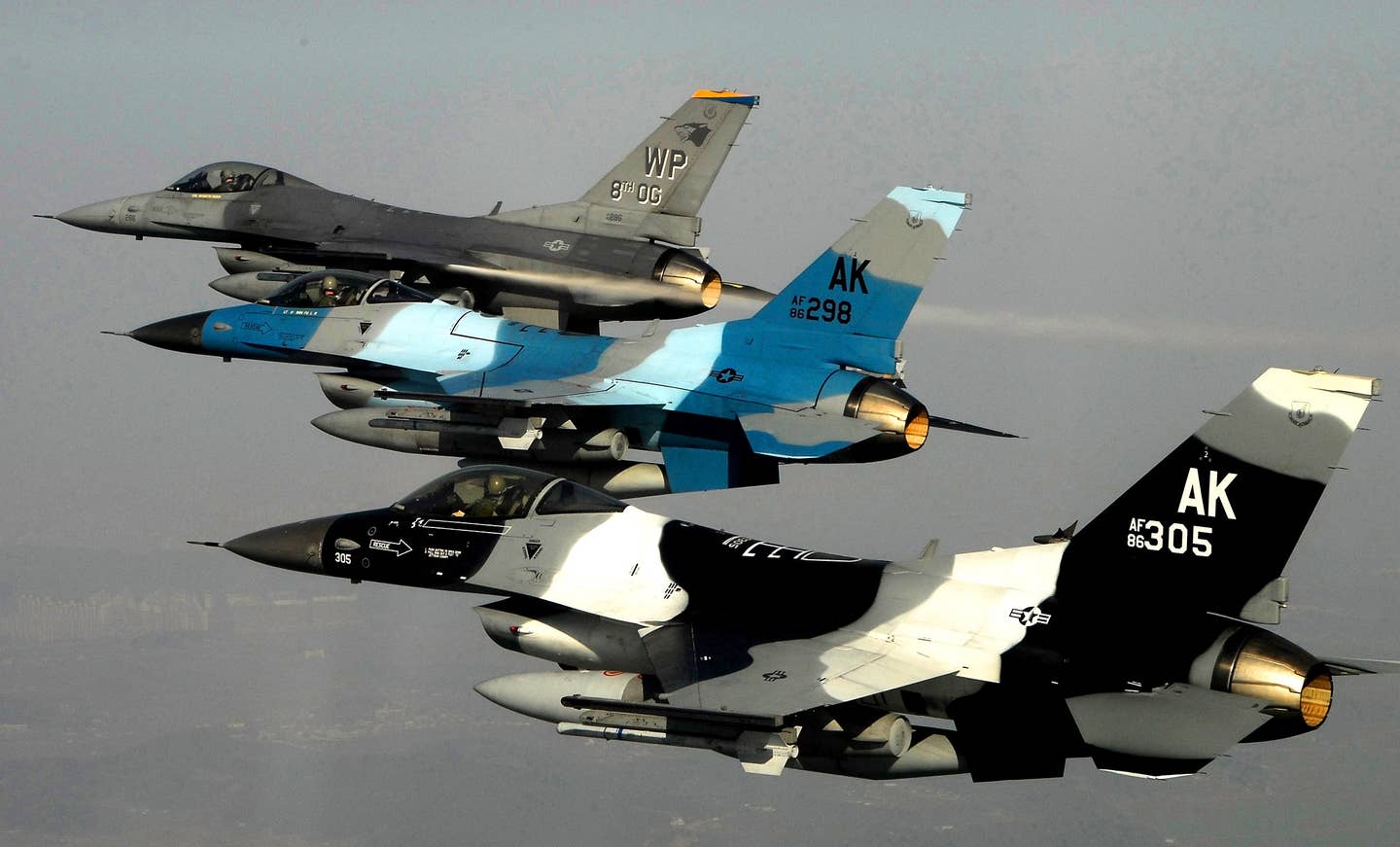 Three U.S. Air Force F-16 Fighting Falcon Block 30 aircraft from the 80th Fighter Squadron fly in formation over South Korea during a training mission on Jan. 9, 2008. (DoD photo by Tech. Sgt. Quinton T. Burris, U.S. Air Force)
