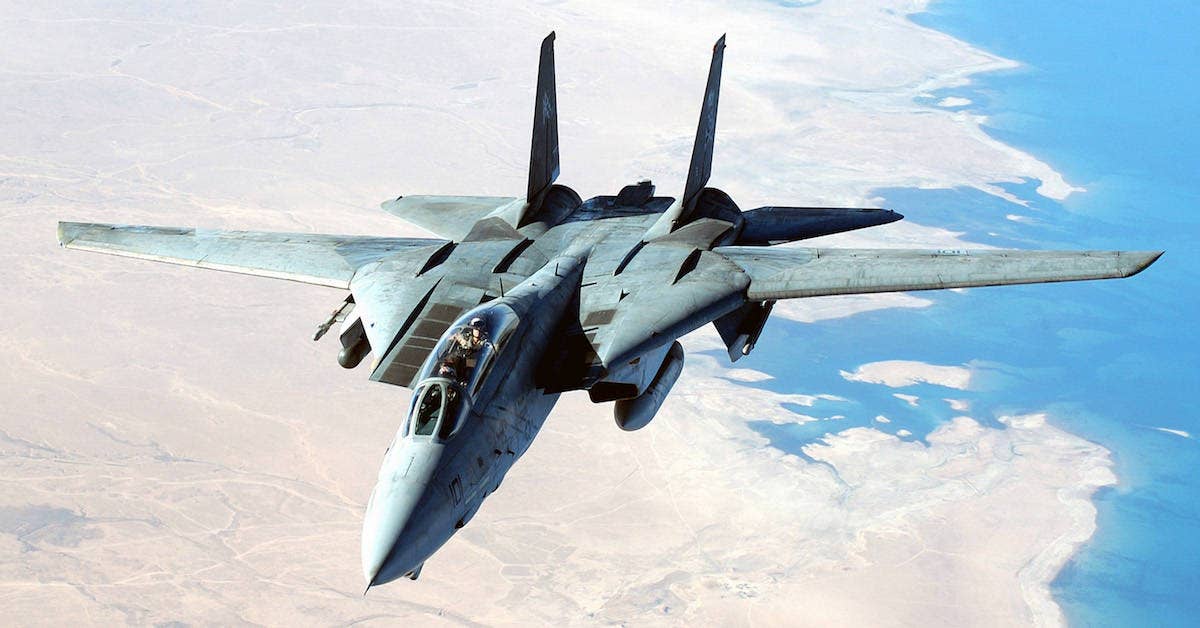 A U.S. Navy (USN) F-14D Tomcat aircraft flies a combat mission in support of Operation Iraqi Freedom. (USAF Photo)