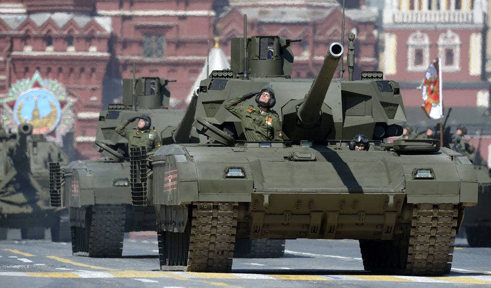 T-72s roll along Red Square. (Photo: AFP)