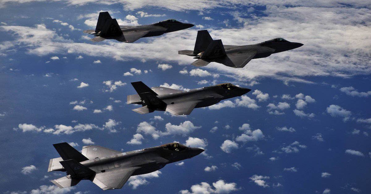 F-35s and F-22s fly in formation. US Air Force photo