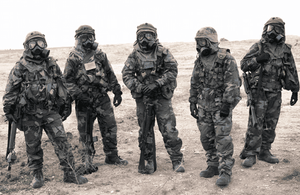 Soldiers train in classic MOPP gear just before Desert Storm in 1991. (Photo: U.S. Army)