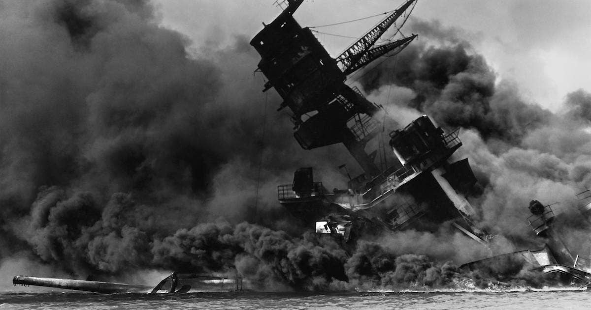 USS Arizona after being struck by Japanese in Pearl Harbor.