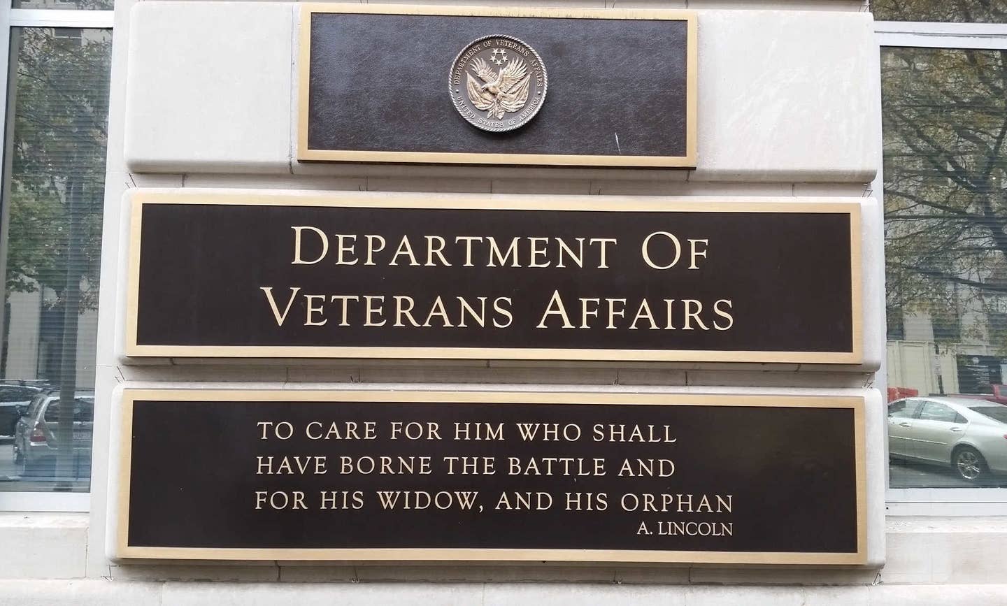 A quote from Abraham Lincoln on a sign at the Department of Veterans Affairs Building in Washington, DC. (Flickr)