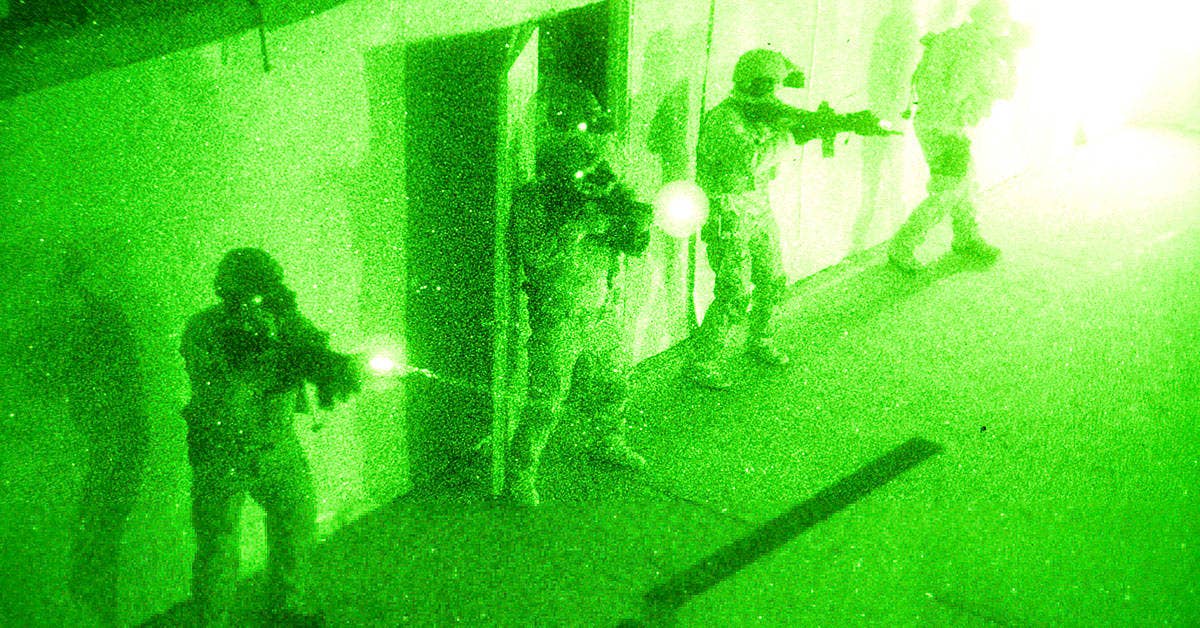 A group of U.S. Navy SEALs clear a room during a no-light live-fire drill near San Diego. (U.S. Navy photo by Mass Communication Specialist 1st Class Daniel Stevenson)