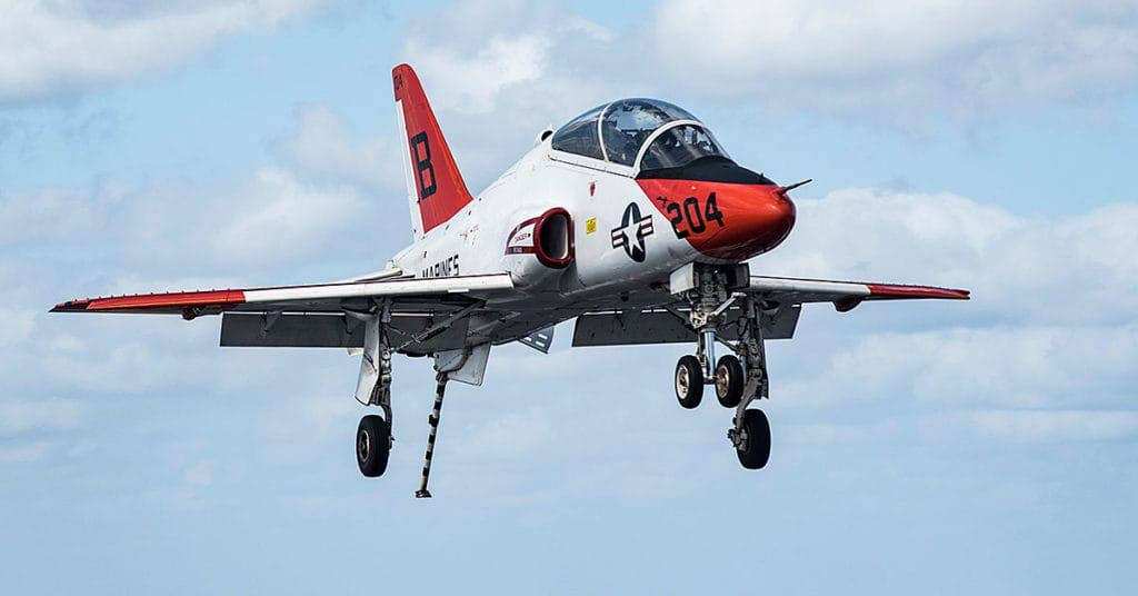 A T-45C Goshawk training aircraft assigned to Carrier Training Wing (CTW) 2 makes an arrested landing aboard the aircraft carrier USS Dwight D. Eisenhower (CVN 69). The ship is conducting aircraft carrier qualifications during the sustainment phase of the Optimized Fleet Response Plan. (U.S. Navy photo by Mass Communication Specialist 3rd Class Nathan T. Beard/Released)