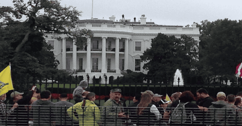 A Secret Service sniper team sets in position keeping a close eye out on the nearby tourists. (Source: zerohedge)