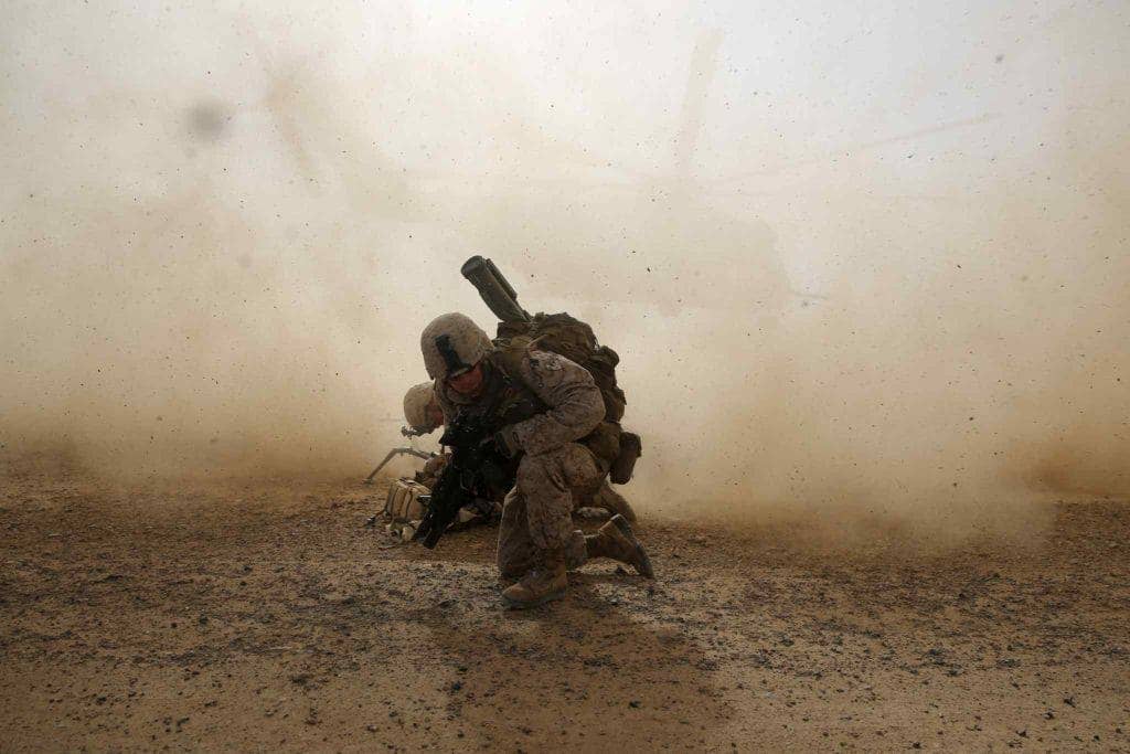 U.S. troops are going to have to get closer to the fight or risk losing hard won gains, DIA chief says. (DoD photo by Cpl. Joseph Scanlan, U.S. Marine Corps/Released)