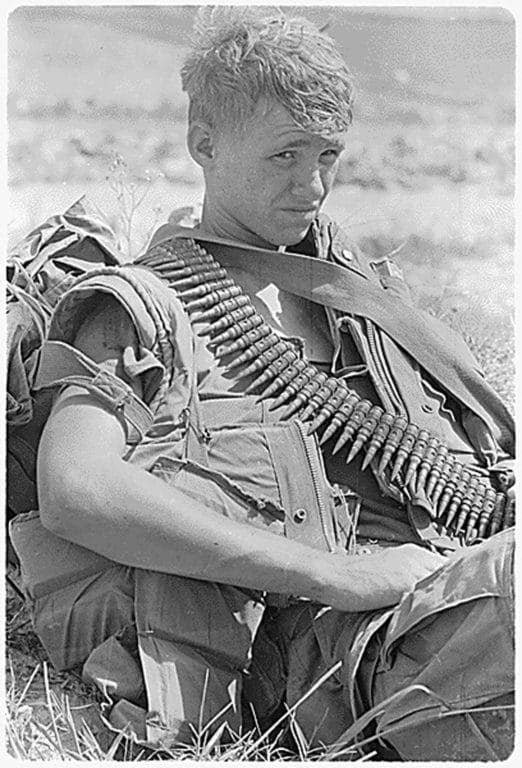 Private First Class Russell R. Widdifield of 3rd Platoon, Company M, 3rd Battalion, 7th Marine Regiment, takes a break during a ground movement 25 miles north of An Hoa, North Vietnam. (Photo: U.S. Marine Corps)