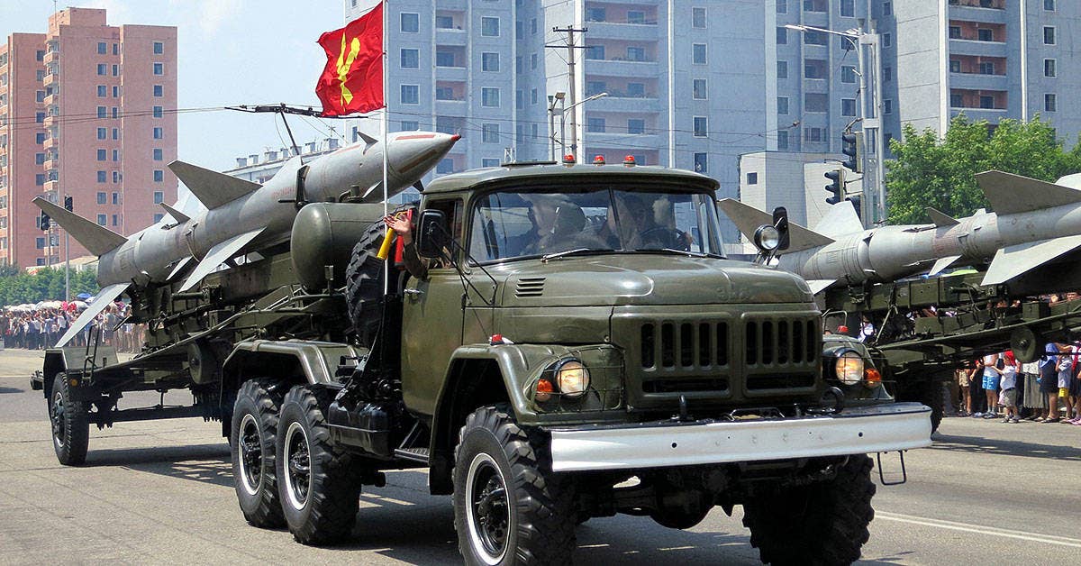 A North Korean anti-aircraft missile drives through Pyongyang. (Photo by Stefan Krasowski via Flickr)