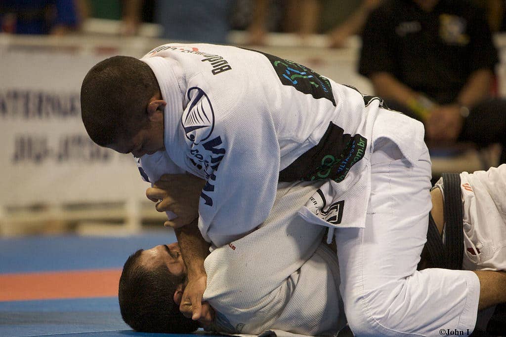 Brazilian Jiu-Jitsu Blackbelt Andre Galvao demonstrating a full-mount grappling position at the 2008 World Jujitsu Championship. (Photo from Wikimedia Commons)