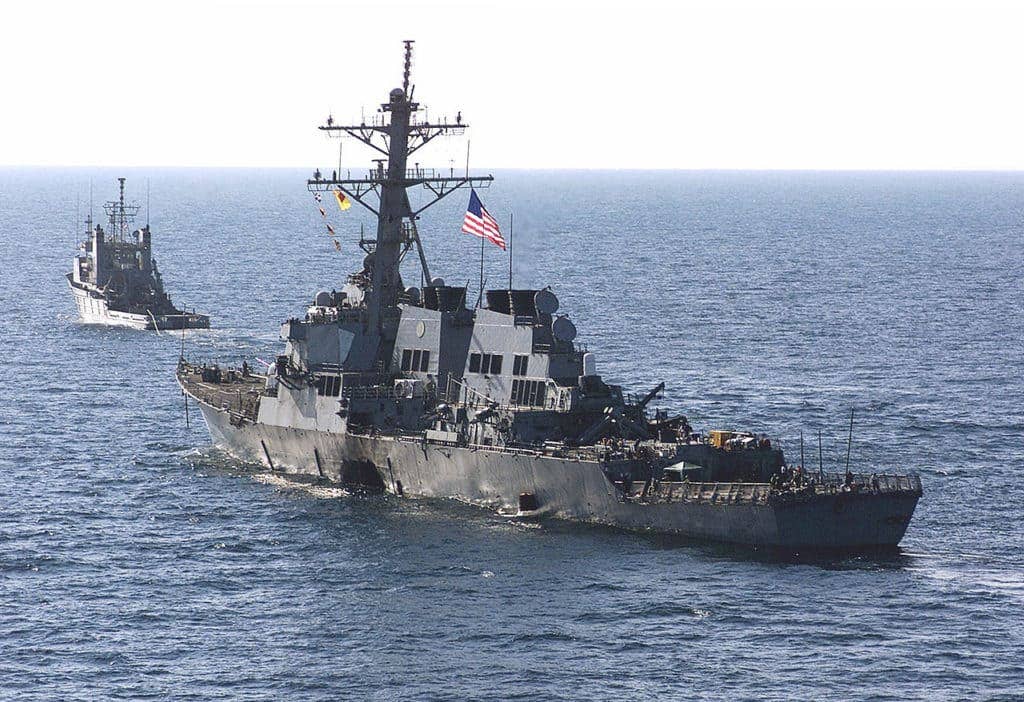USS Cole (DDG 67) is towed from Aden by the tug USNS Catawba (ATF 168). (U.S. Navy photo)