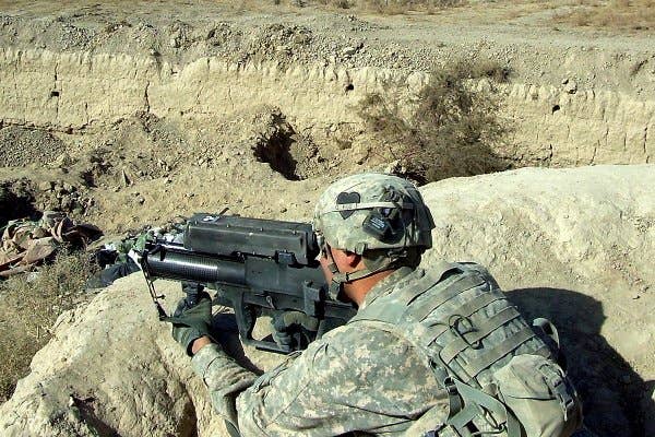 The XM25 fires a programmable airburst 25mm smart round. It proved itself in Afghanistan, but it was placed on hold. (US Army photo)