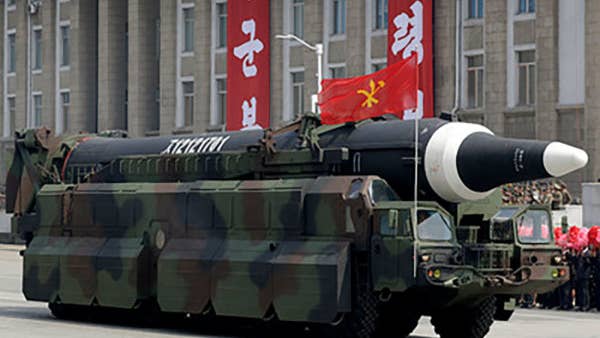 North Korea says new missile can carry heavy nuke