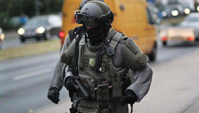 An SEK wearing chain mail under his assault vest while responding to a threat (Photo from Snopes.com)