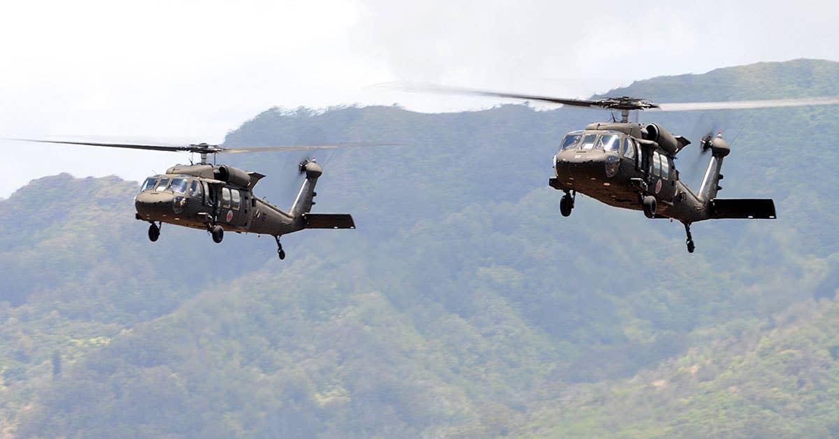 Two UH-60 Black Hawk helicopters from Company C, 1st Battalion, 207th Aviation Regiment. Photo from DoD.