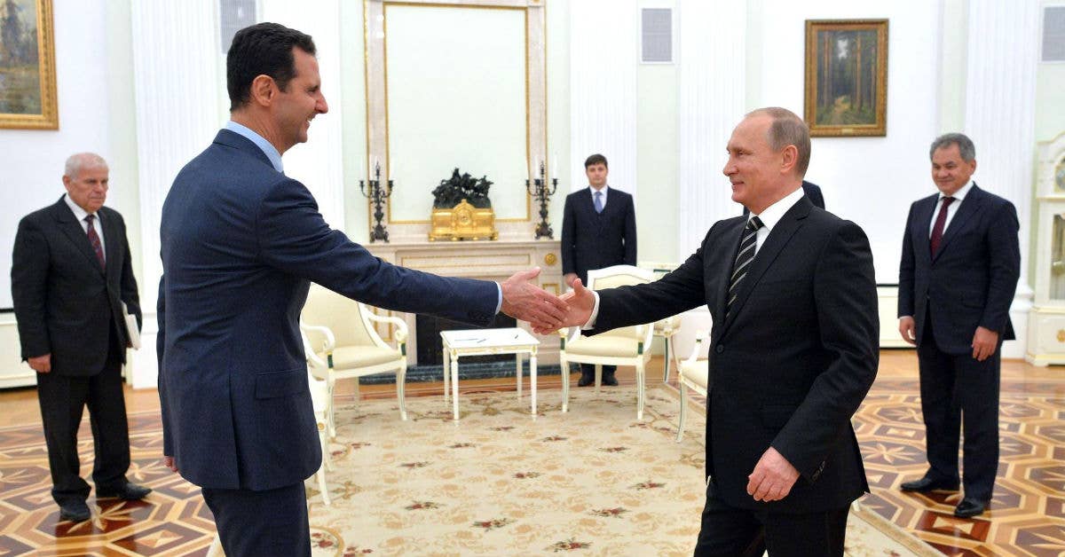 Russia President Vladimir Putin (right) meets with Syrian President Assad. Photo from Moscow Kremlin.