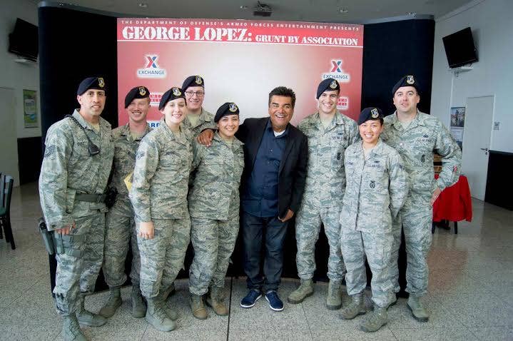 Comedian George Lopez with Air Force airmen. (Photo: Sean Gilfillan)