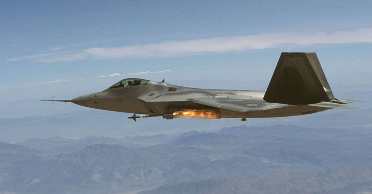 An F-22A Raptor fires an AIM-9M Sidewinder missile. Photo from Wikimedia Commons.