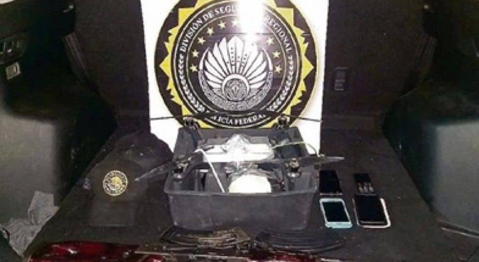 The seized 3DR Solo quadcopter drone, rigged with a remote-detonated improvised explosive device. (Mexican Federal Police photo)