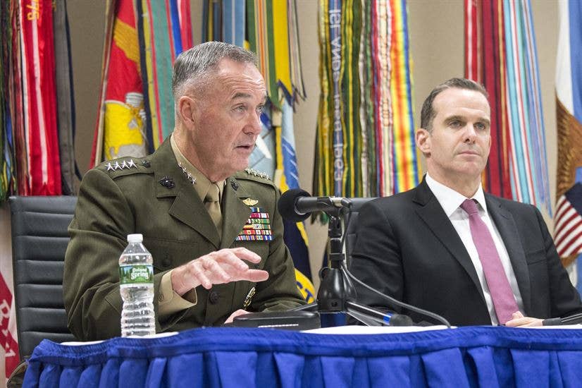 Marine Corps Gen. Joe Dunford, chairman of the Joint Chiefs of Staff, delivers remarks alongside special envoy for the Global Coalition to Counter the Islamic State of Iraq and Syria, Brett H. McGurk, during a press conference following the 2017 Chiefs of Defense Conference at Fort Belvoir, Va., Oct. 24, 2017. The conference brought together defense chiefs from more than 70 nations to focus on countering violent-extremist organizations around the globe. DoD photo by Petty Officer 1st Class Dominique Pineiro