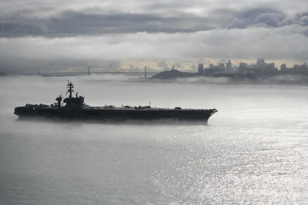The Nimitz-class aircraft carrier USS Carl Vinson (CVN-70) departs San Francisco. (U.S. Navy photo by Lt.j.g. Pete Lee)