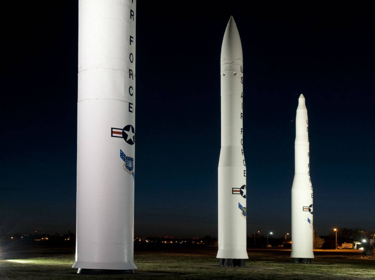 A static display of ICBMs. From left are the Peacekeeper, the Minuteman III, and the Minuteman I. USAF photo by R.J. Oriez.
