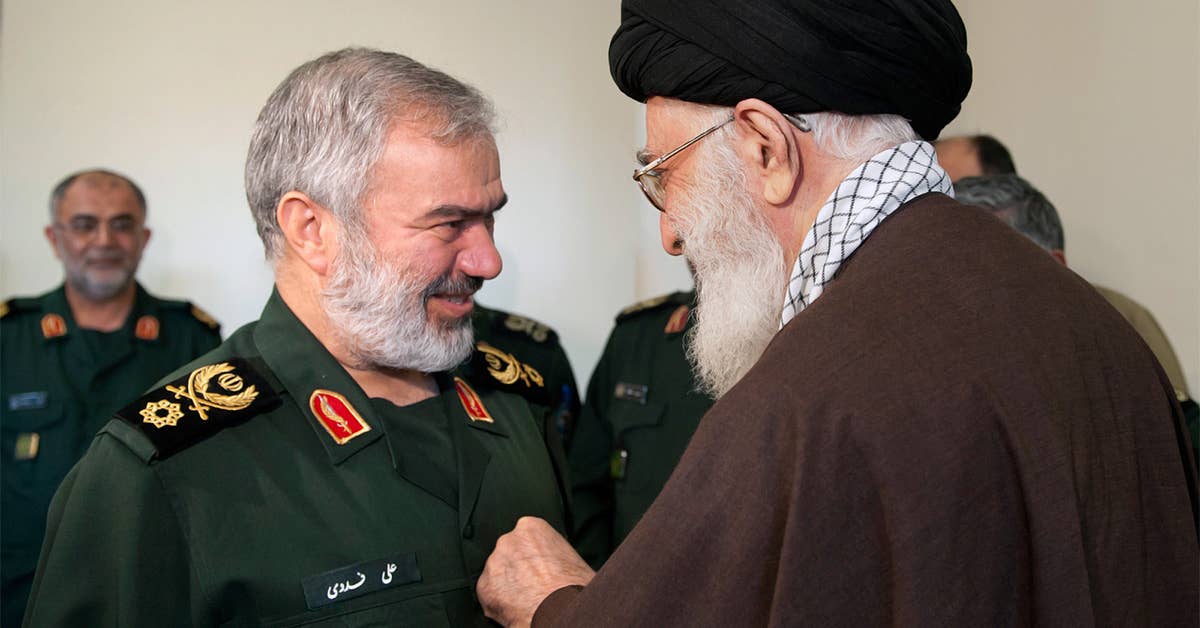 Ayatollah Seyyed Ali Khamenei Gives the Order of conquest to Brigadier General Ali Fadavi and four other commanders of the Islamic Revolutionary Guard. Wikimedia Commons photo by user Khamenei.ir.