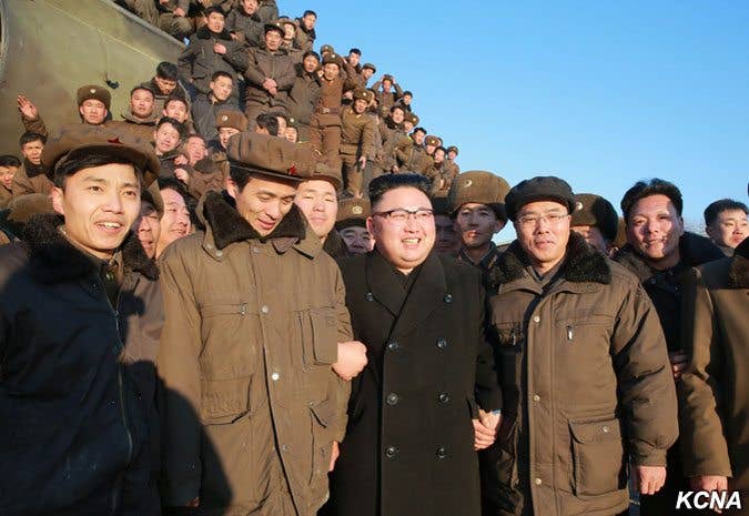 Kim Jong Un with North Koreas just after the test fire of a surface to surface medium long range missile.(image KCNA)